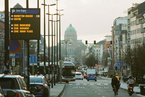 a city street filled with lots of traffic