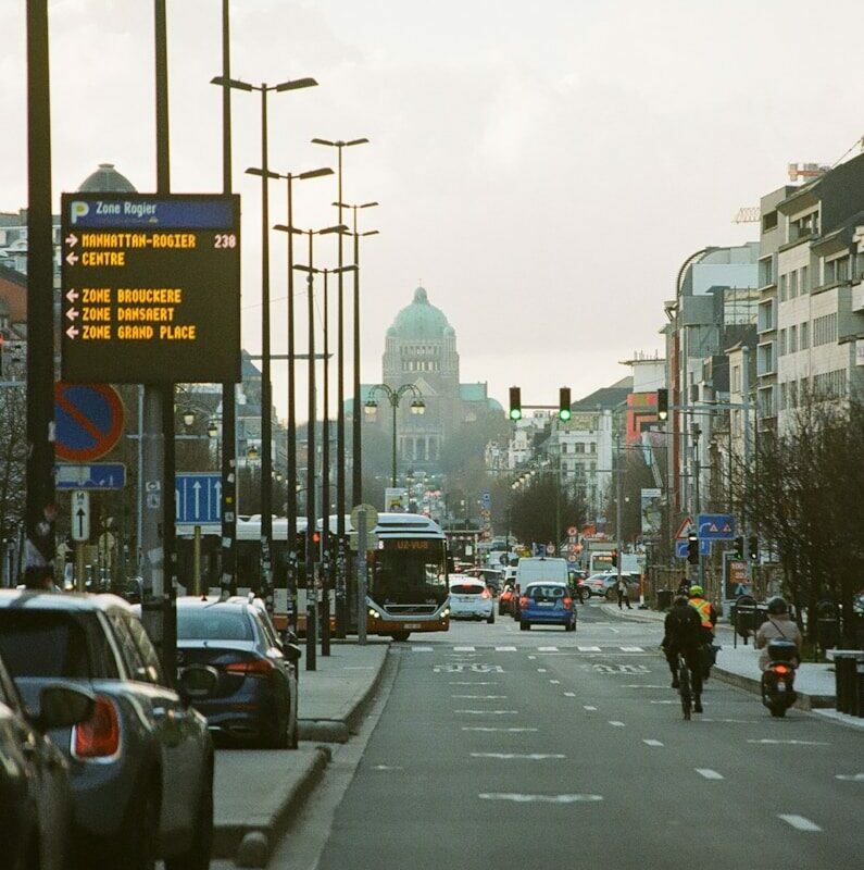 a city street filled with lots of traffic